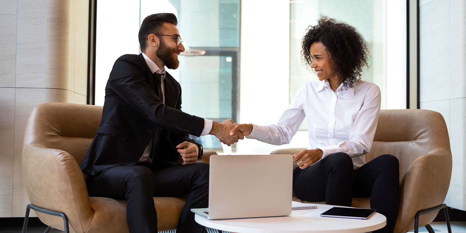 4-Tips-Better-Hiring-Experience-2022-Two-People-Meeting