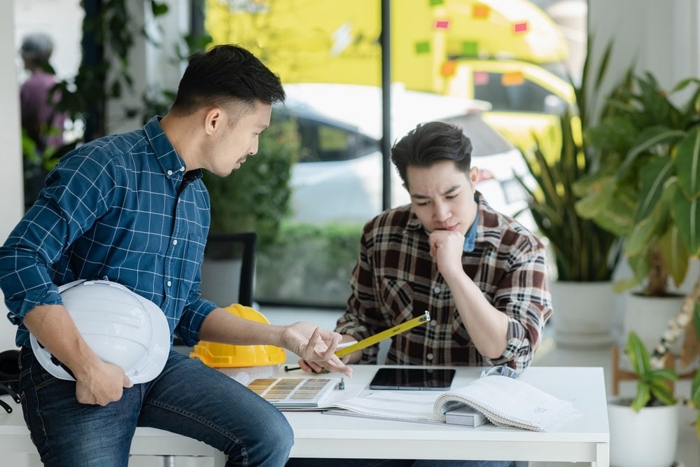 Asian engineer team and architects working designing planing of project,